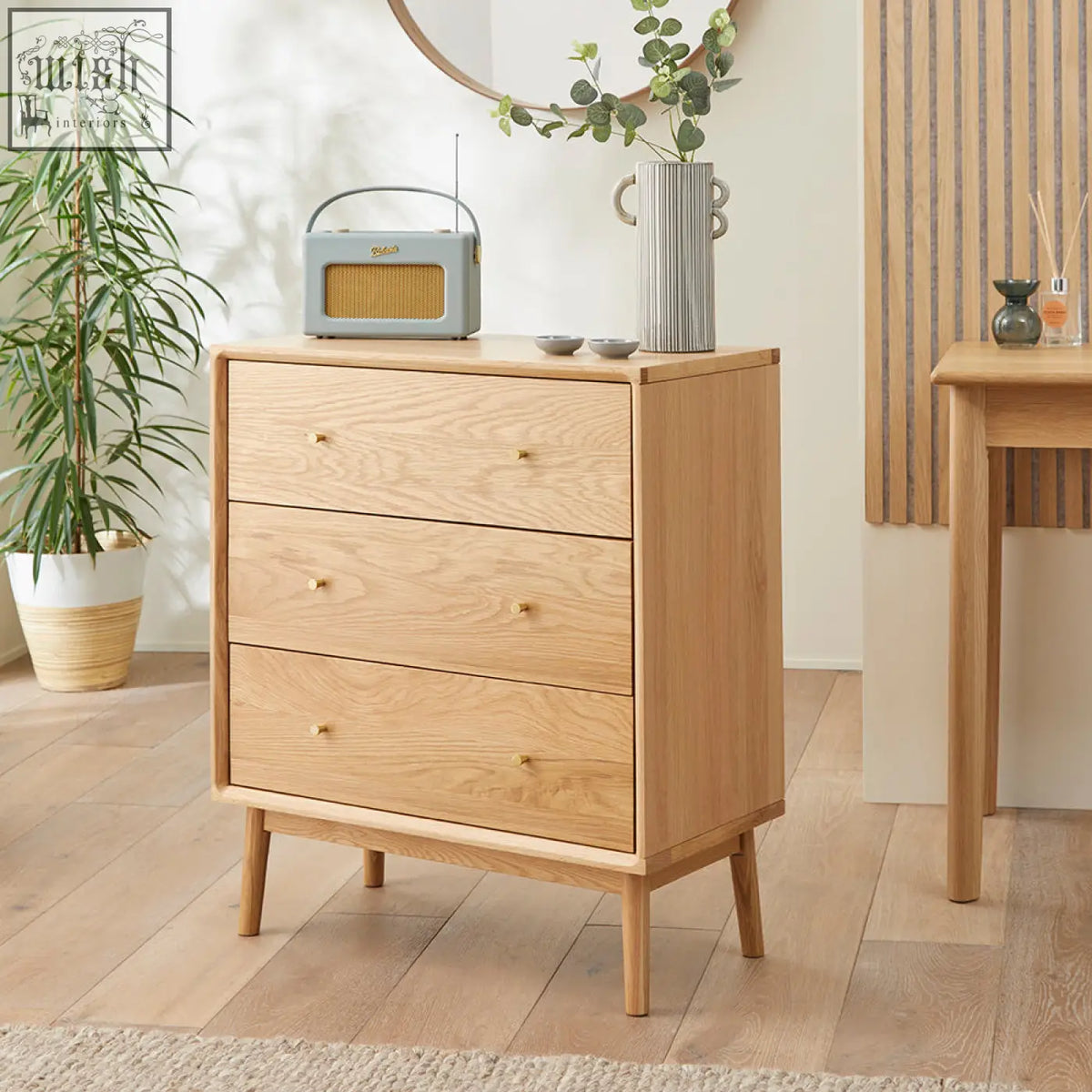 Light oak wright oak chest with three drawers and slender tapered legs perfect for stylish storage