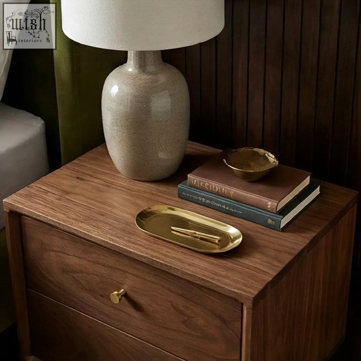 Sleek two-drawer walnut bedside table with solid walnut build brass handles and warm wood grain finish