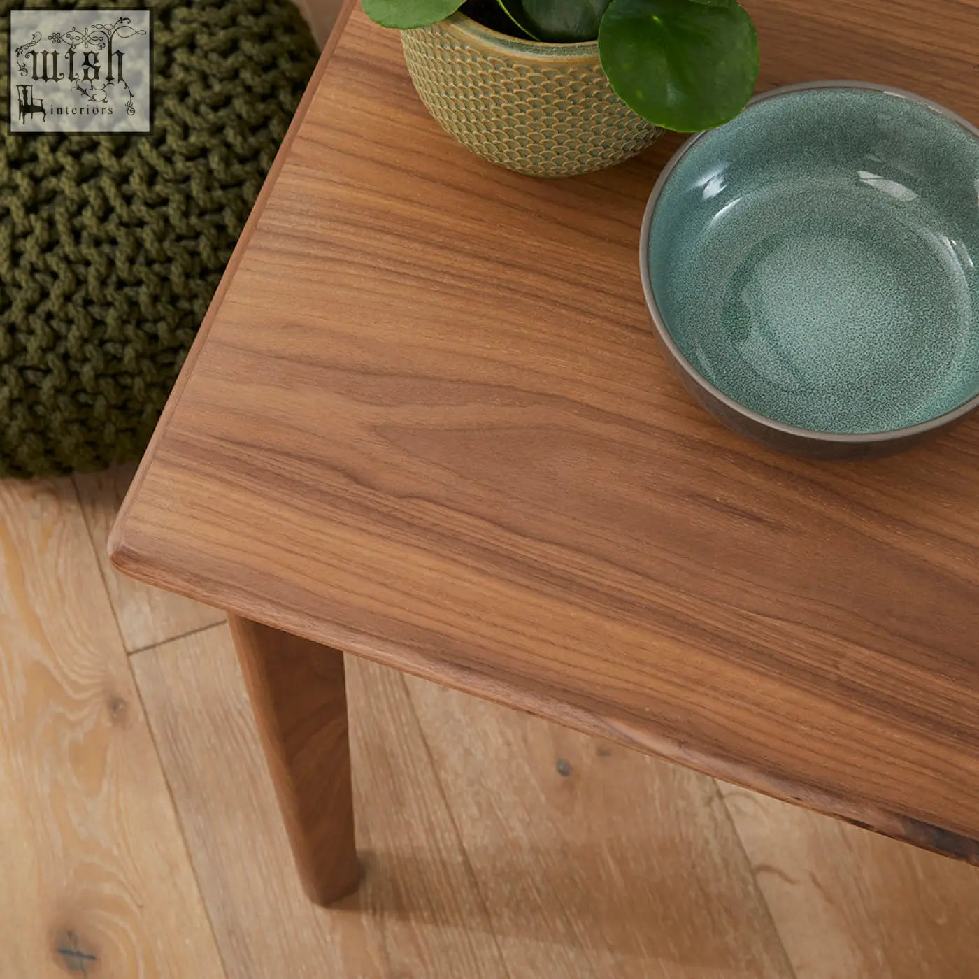 A sleek light brown solid walnut side table with wood drawer runners featured in the wright walnut desk and dressing table with year warranty