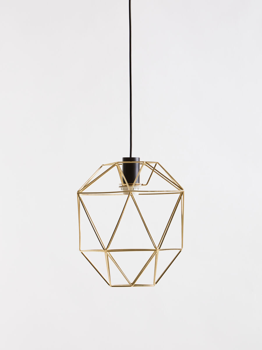 Wyra champagne gold pendant light with a gold-toned faceted geometric frame and black cord hanging fixture