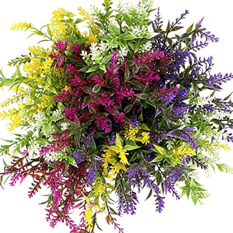 A vibrant arrangement of green, yellow, purple, and magenta plastic faux flowers perfect for outdoor fake plants decor