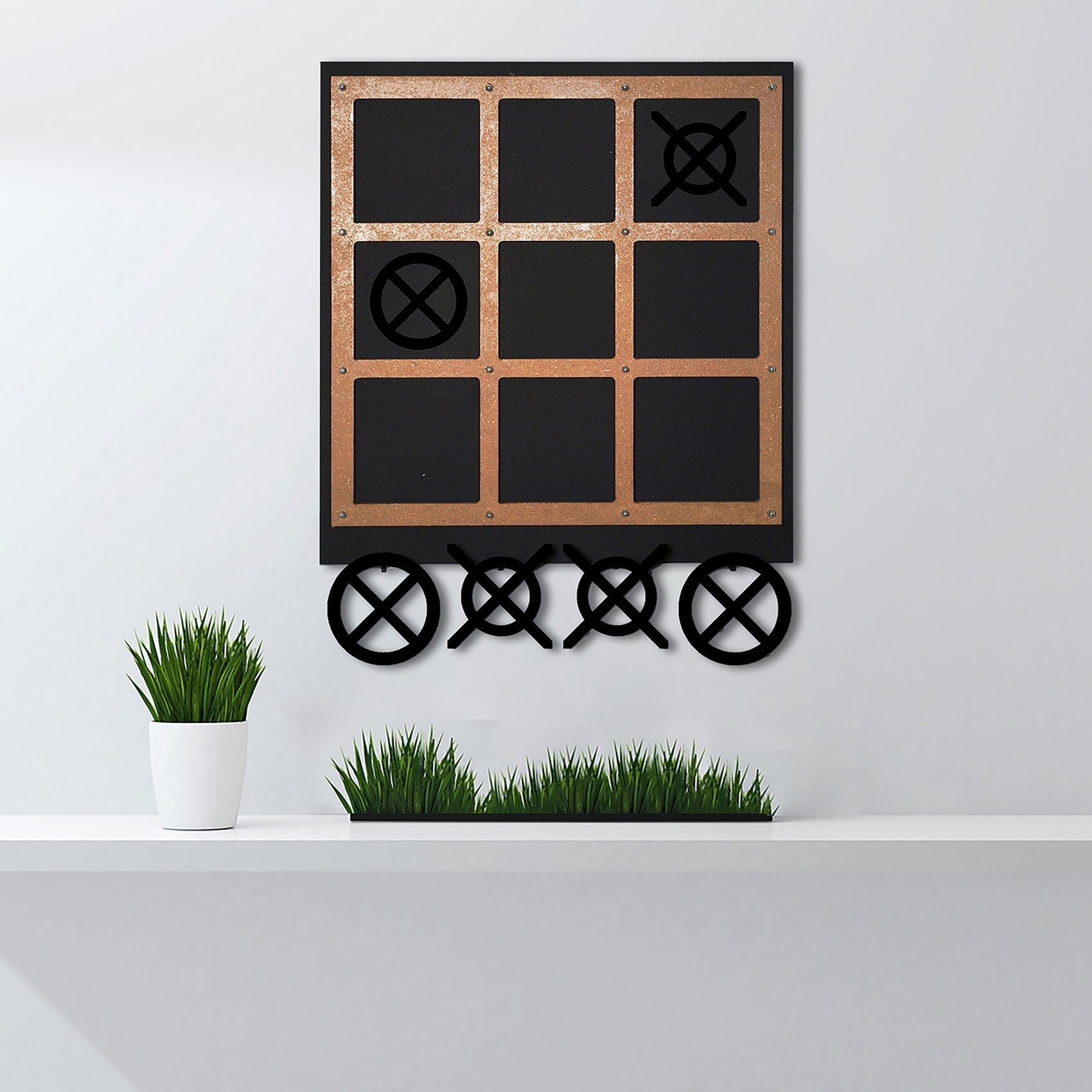 Black and copper metal tic tac toe wall art with circular x and o pieces for the xox board three in a row game