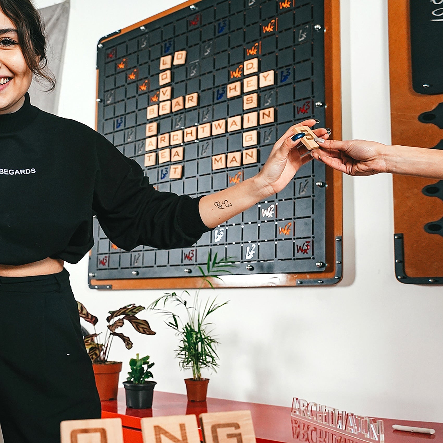 Wooden letter tiles w and e from the xxl black words game classic word game to boost vocabulary skills
