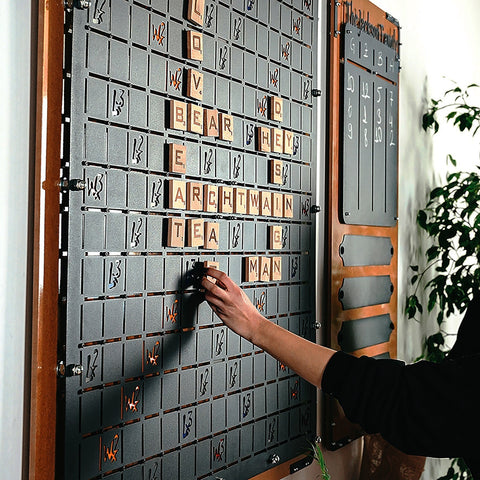 Xxl black words game wooden scrabble board with letter tiles on a dark gray grid for classic word game fun and vocabulary skills