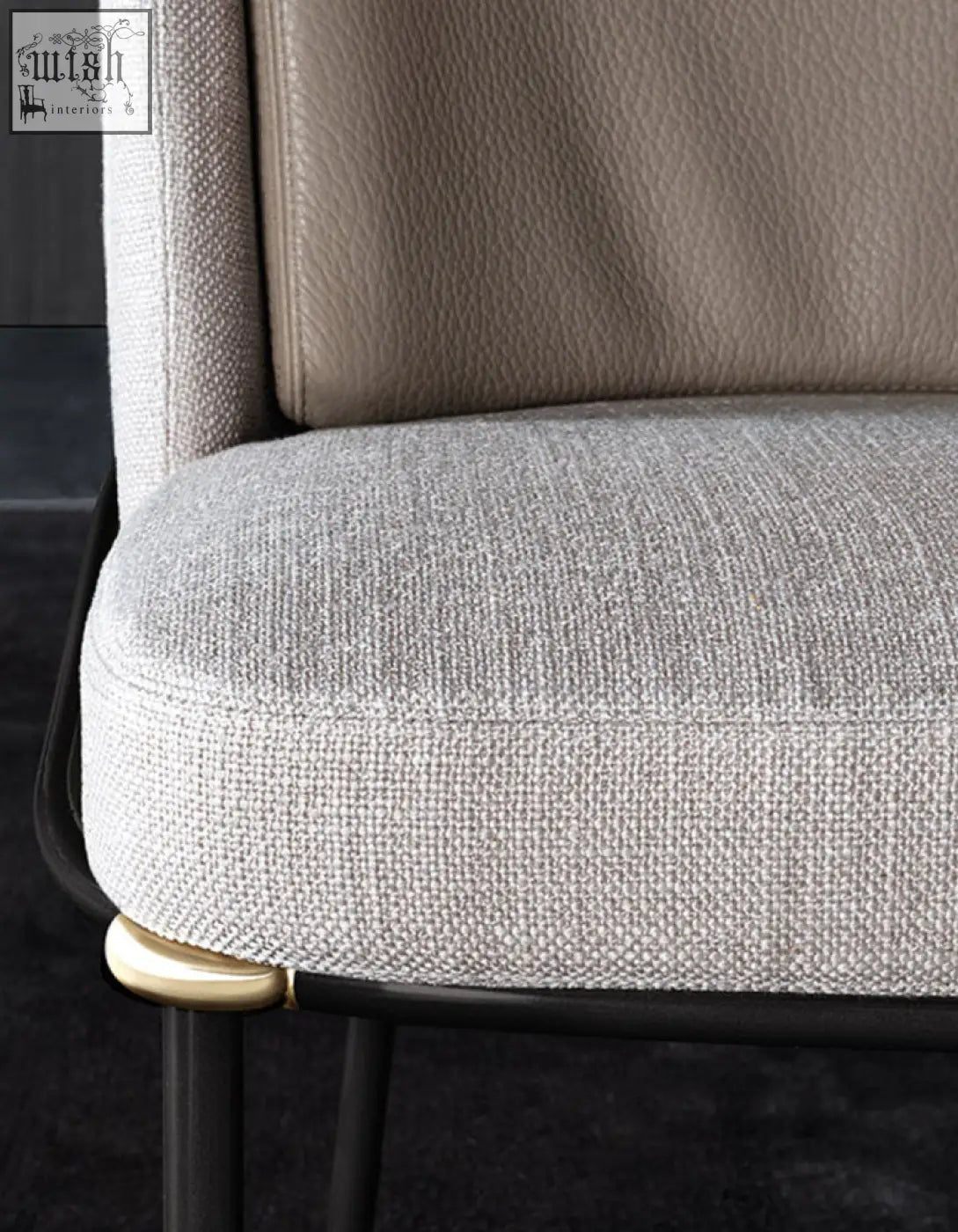 Y7 velvet dining chair with textured gray velvet fabric seat and backrest, black metal legs, and gold hardware accents