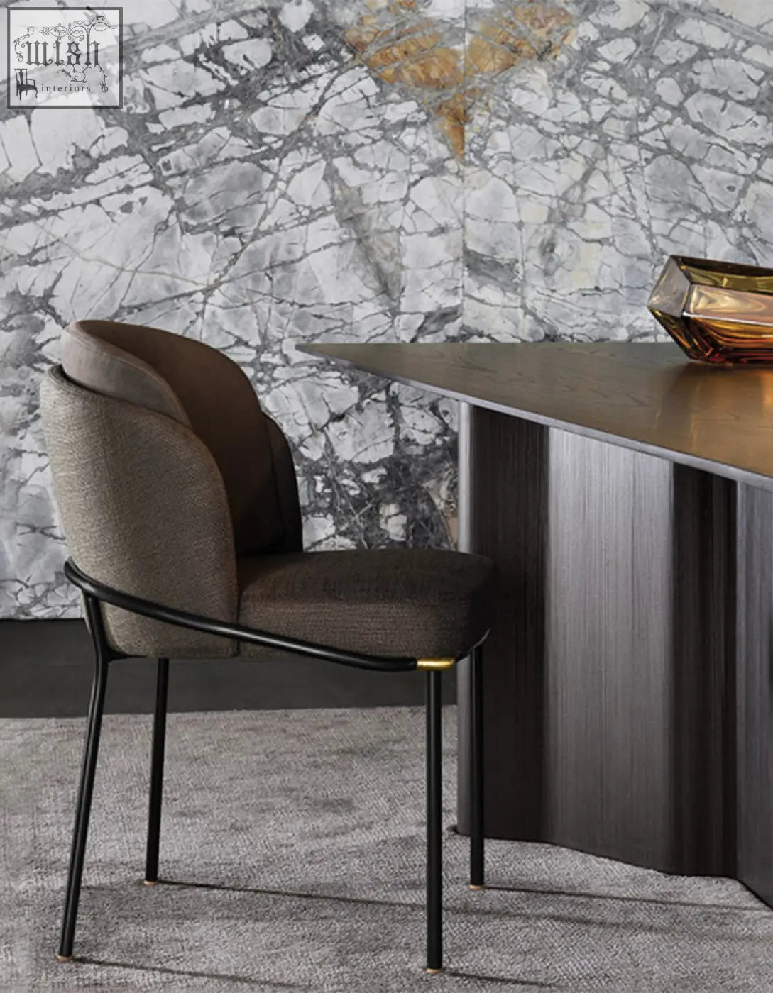 Modern y7 velvet dining chair with taupe velvet upholstery, sleek black metal frame, and gold accent legs