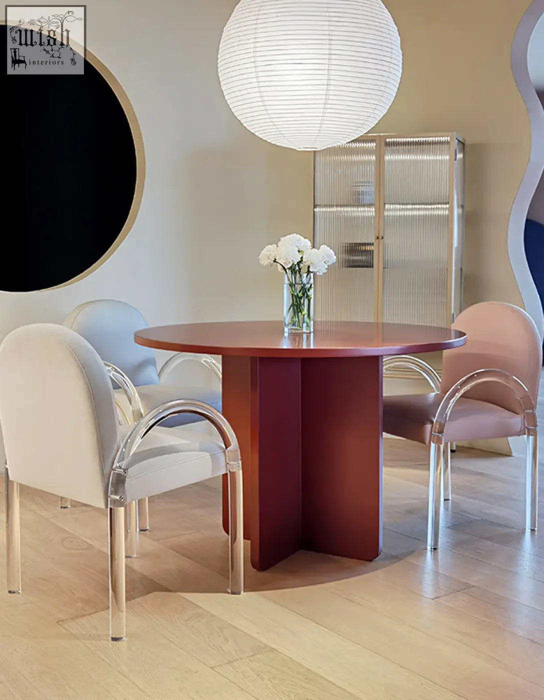 Round accent table with warm reddish-brown wooden finish and minimalist design perfect as a dining table or accent piece