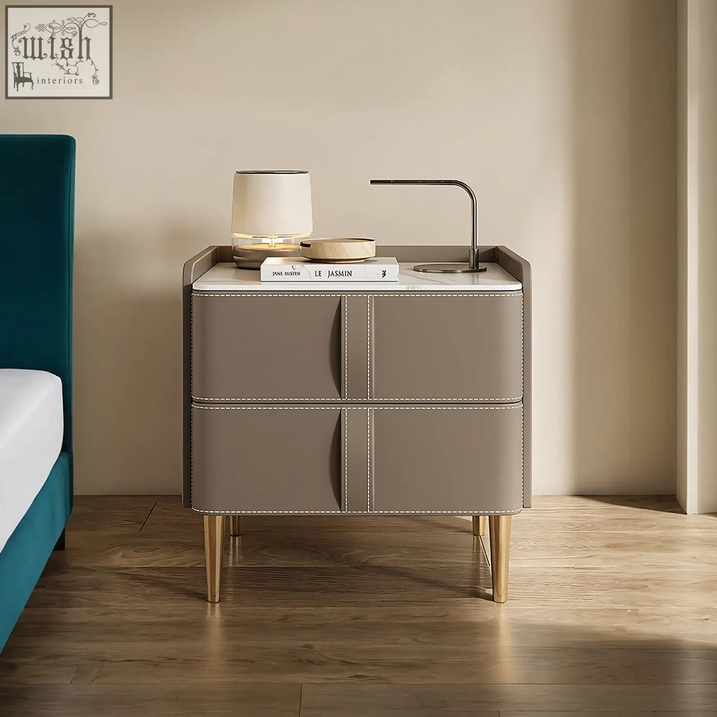 Modern taupe leather yano bedside table with white stitching and gold-tone legs on solid wood frame in brown
