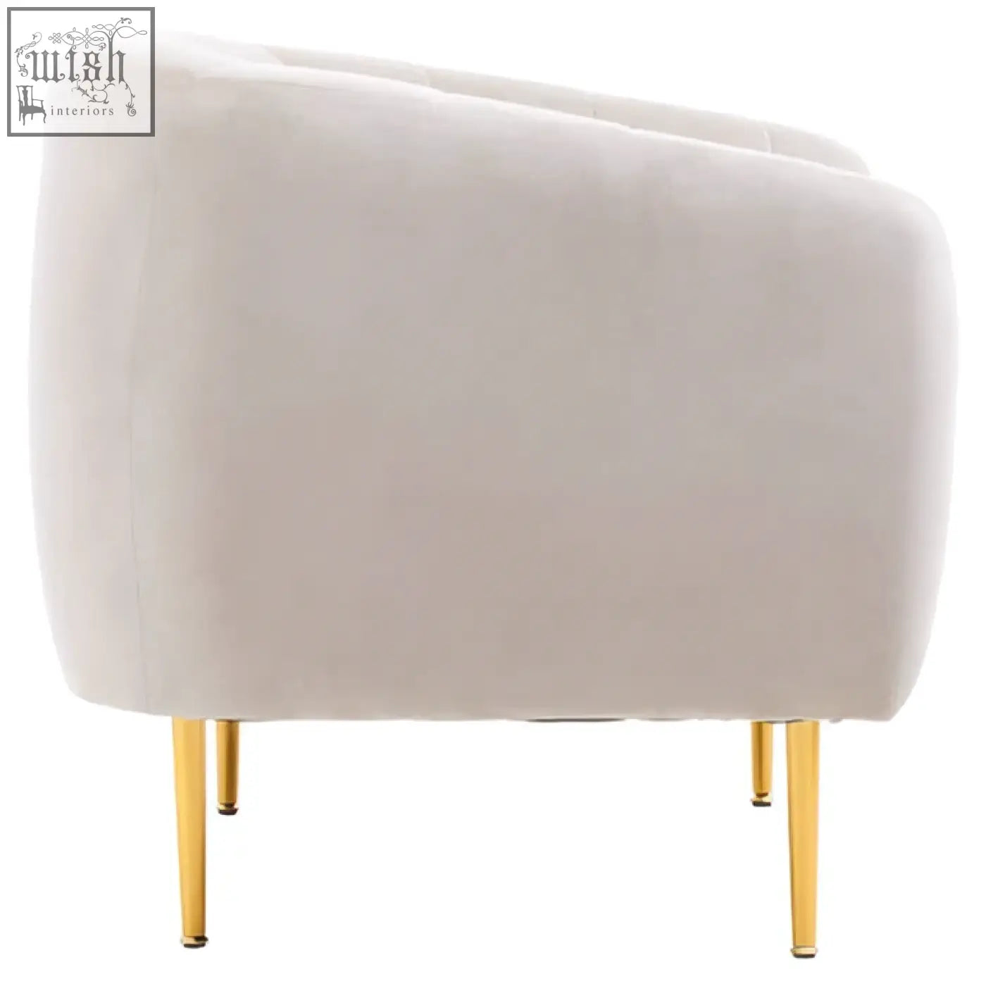Cream-colored velvet armchair with sleek gold metal legs in the style of yasmeen silver grey velvet armchair