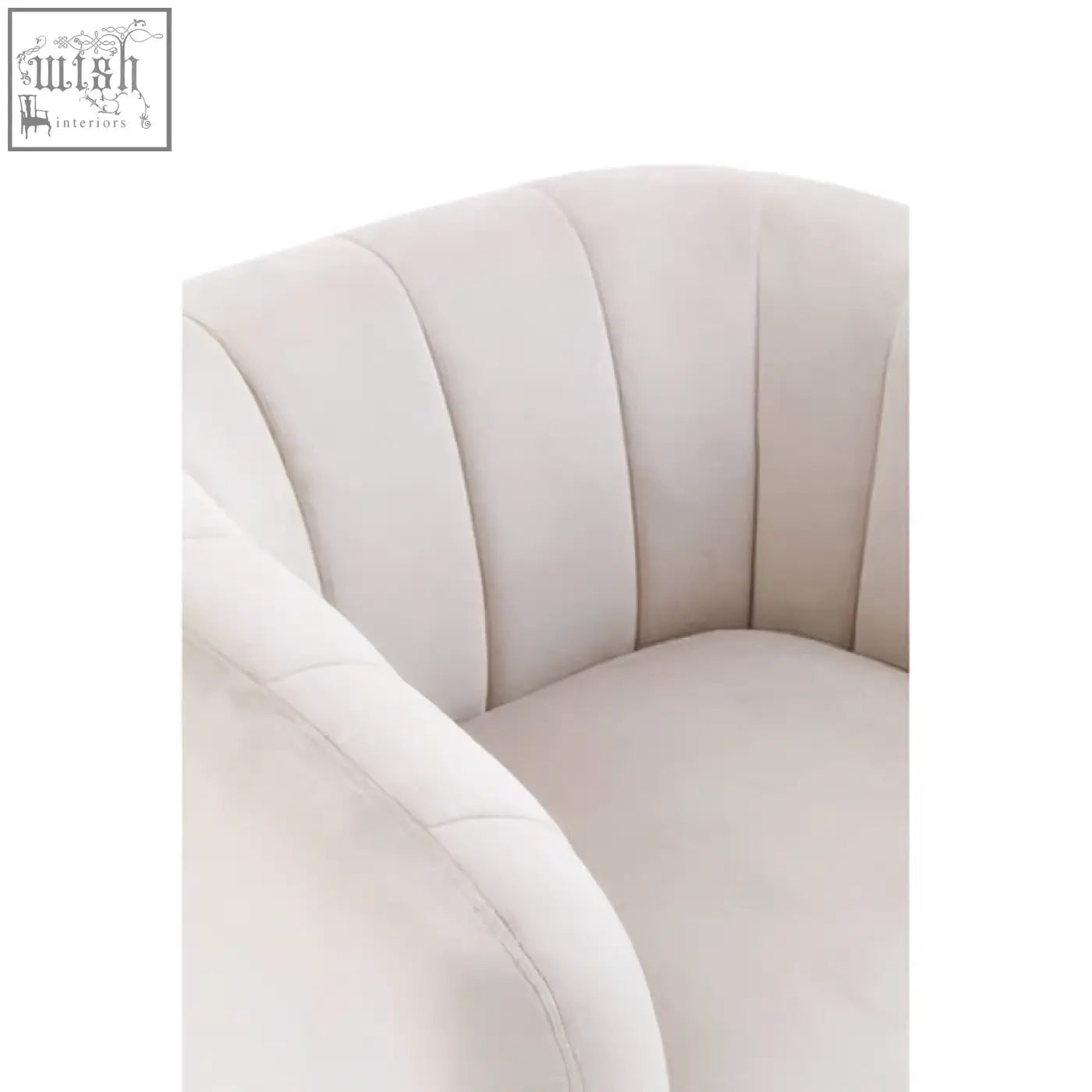 Cream-colored velvet armchair with curved tufted backrest and soft rounded arms from yasmeen silver grey velvet armchair collection