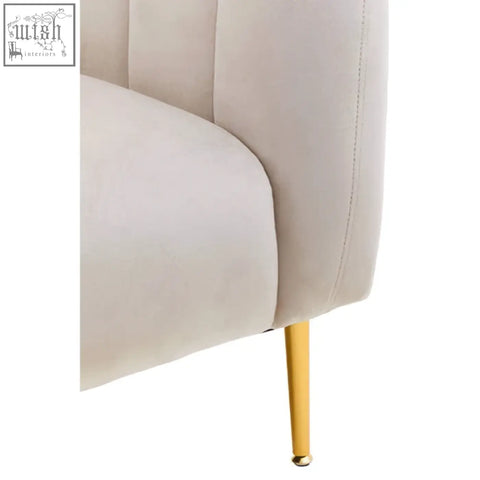 Cream-colored velvet armchair with gold-tone metal legs from the yasmeen silver grey velvet armchair collection