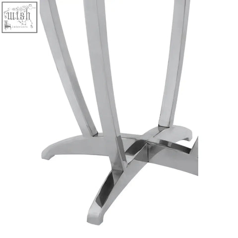 Chrome finished metal table base with sleek curved legs and star-shaped foot for yasmin black tempered glass side table