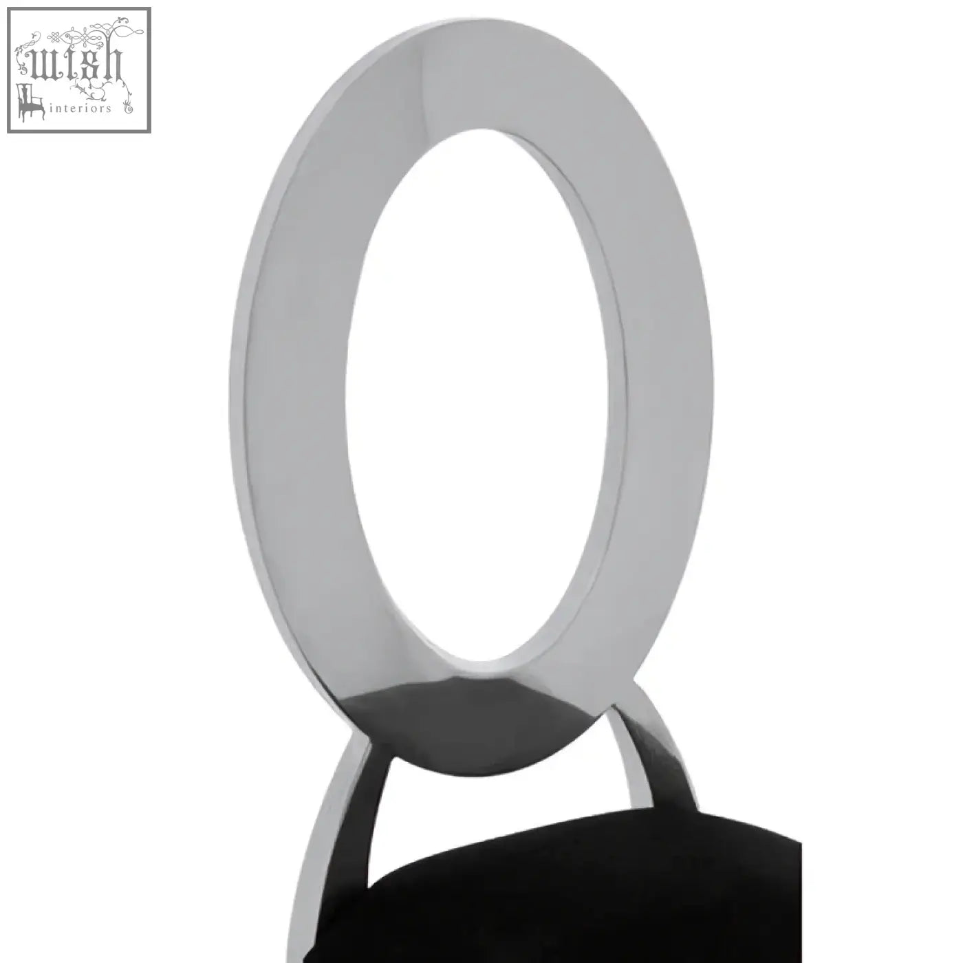 Chrome finished oval ring back of yasmin black velvet dining chair with black upholstered seat visible from back