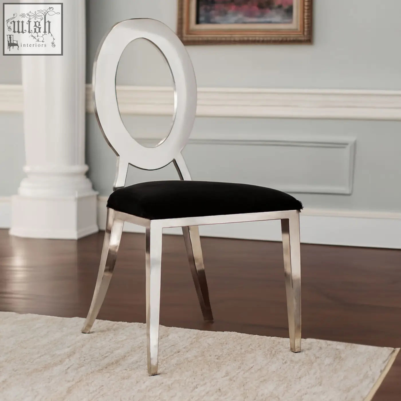 Elegant silver-finished yasmin oval back dining chair with plush black velvet seat perfect as a black velvet dining chair