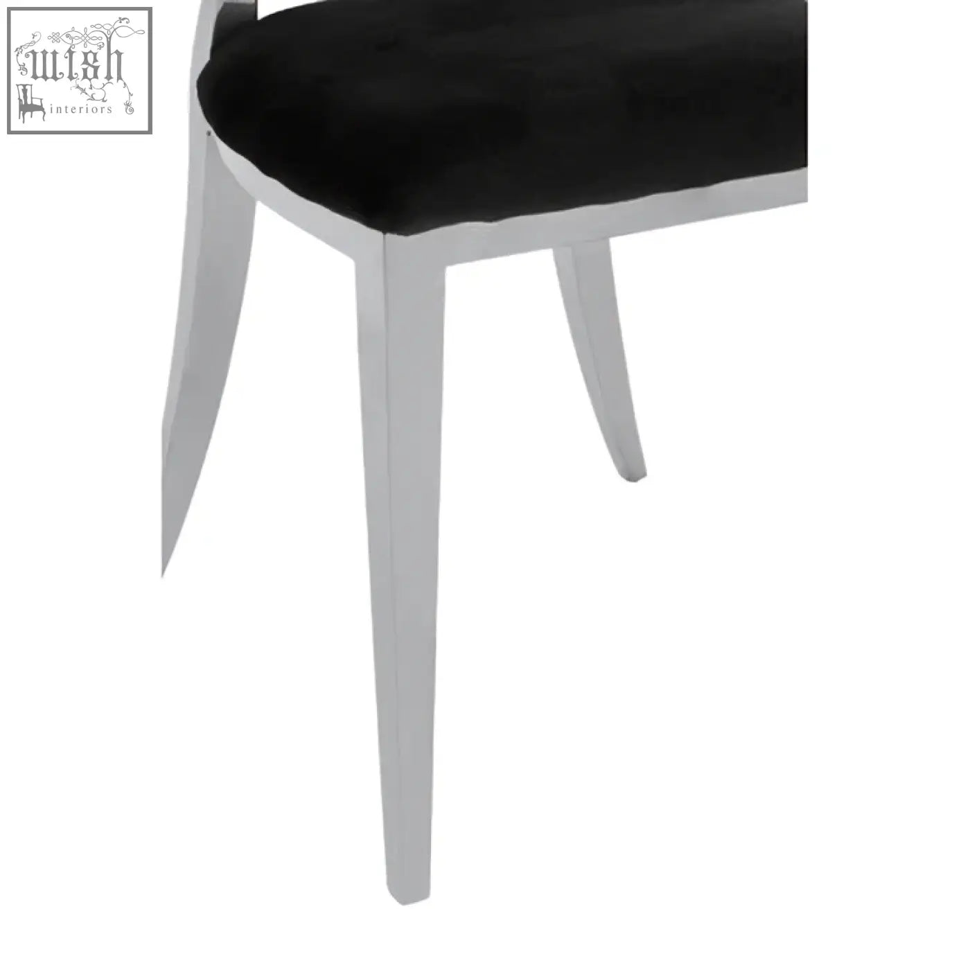 Black velvet dining chair with oval back and sleek silver metal legs perfect for stylish dining spaces