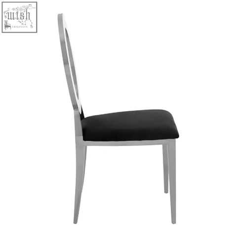 Yasmin oval back black velvet dining chair with sleek chrome frame and elegant oval back design in black velvet