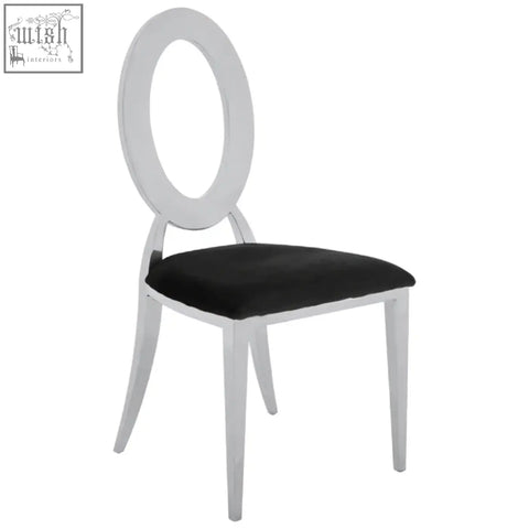 White oval-backed dining chair with black velvet seat perfect as a stylish black velvet dining chair