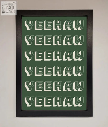 Dark green framed yeehaw framed poster with bold cream yeehaw text in block letters perfect for wall decor