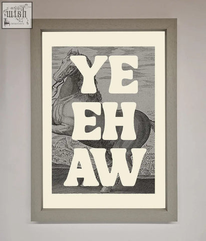 A yehaw framed poster featuring bold white lettering over a black and white horse illustration in a sleek frame