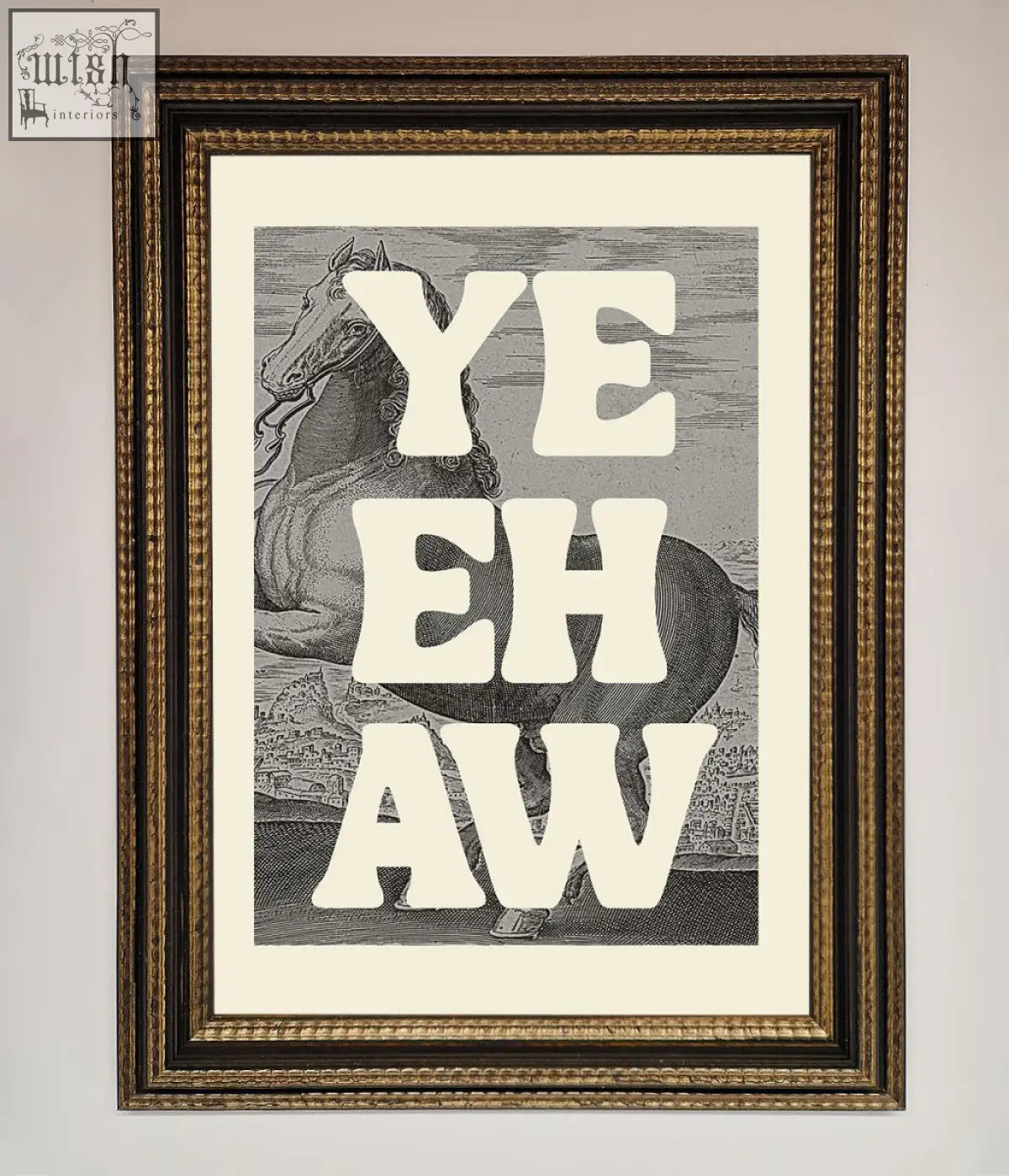 A yehaw framed poster with bold white lettering on a black and white horse illustration in a gold-toned ornate frame