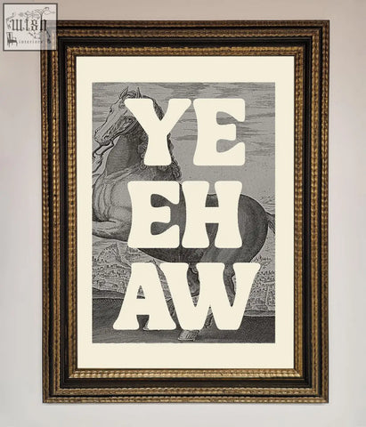 A yehaw framed poster with bold white lettering on a black and white horse illustration in a gold-toned ornate frame