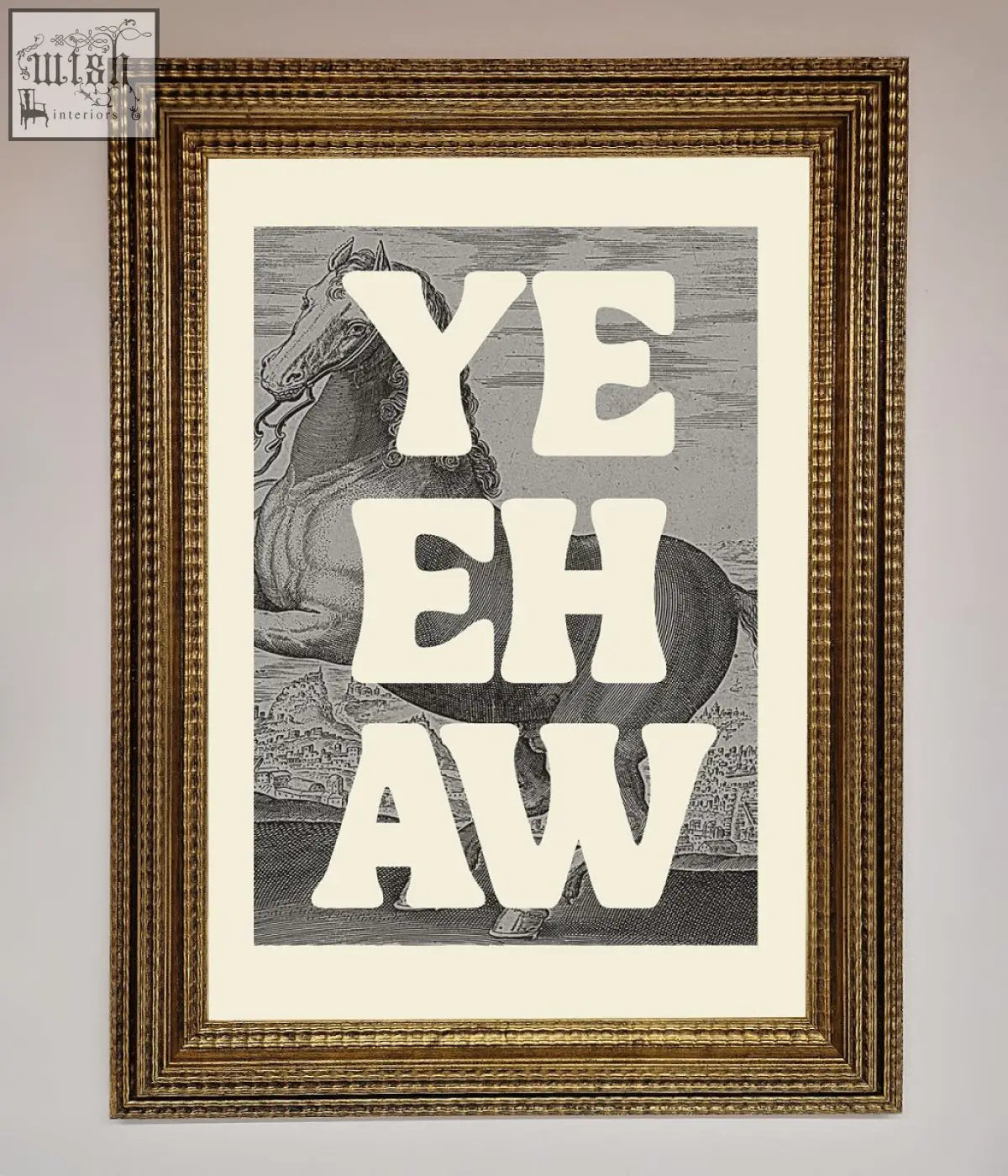 Gold-framed yehaw framed poster with bold white lettering over black and white horse illustration
