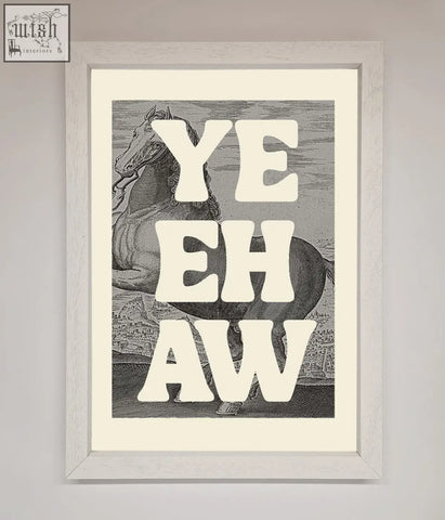 A yehaw framed poster with bold white lettering over a black and white horse illustration in a sleek frame