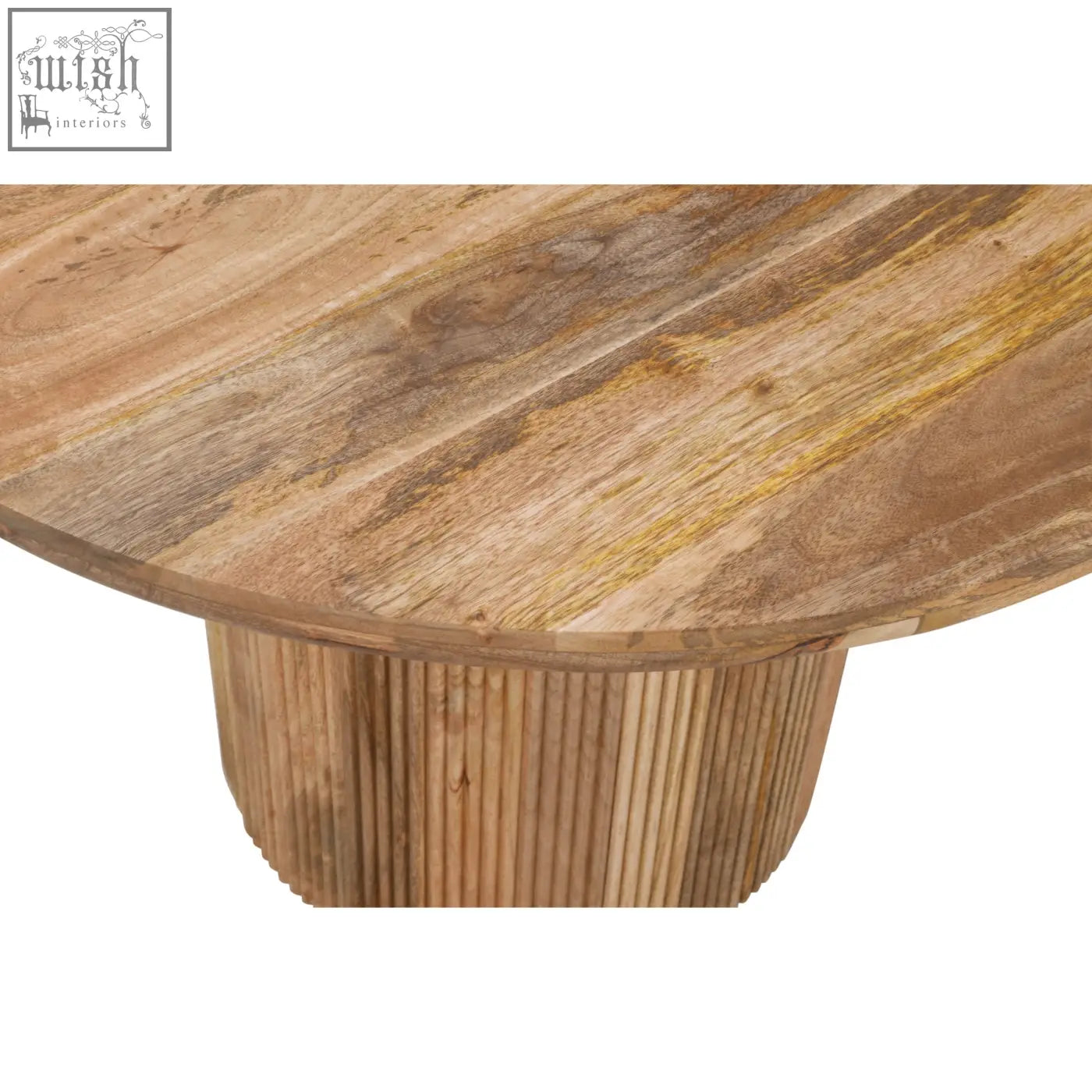 Round wooden coffee table with natural solid wood finish and vertical fluted legs in york natural solid wood style