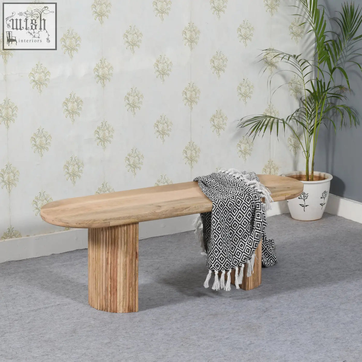 York solid wooden dining bench with smooth light mango wood surface and vertical slatted cylindrical legs