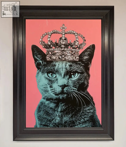 A framed print of a teal majesty cat framed wearing a silver crown on a vibrant pink background cat framed print