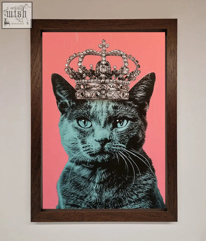 Your majesty cat framed print featuring a black cat with teal eyes and silver crown on vibrant pink background