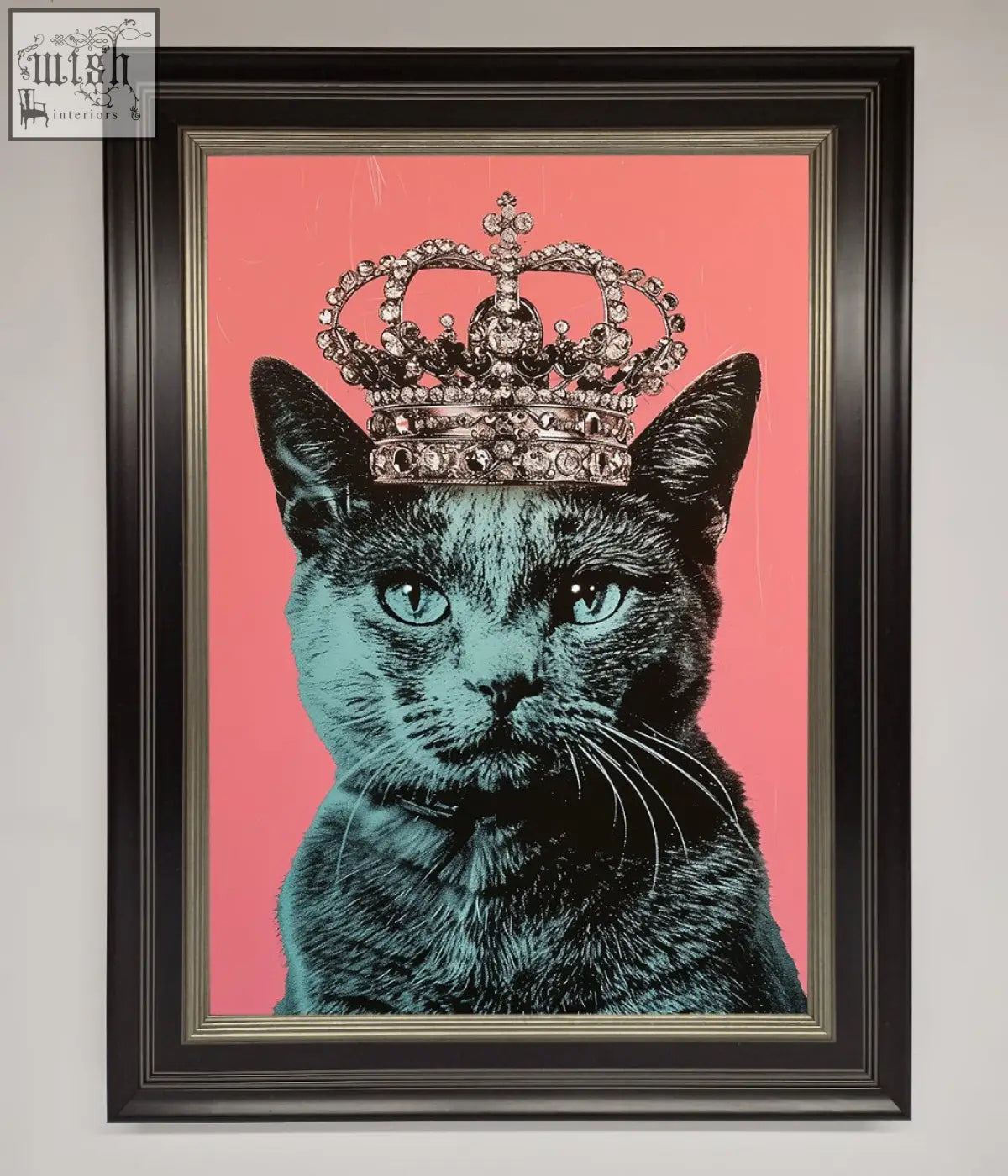 Your majesty cat framed print showing a black cat with teal eyes wearing a jeweled crown on vibrant pink background