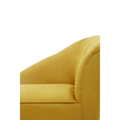 A plush yvette mustard velvet right hand chaise longue with a curved tufted backrest and soft cushioning