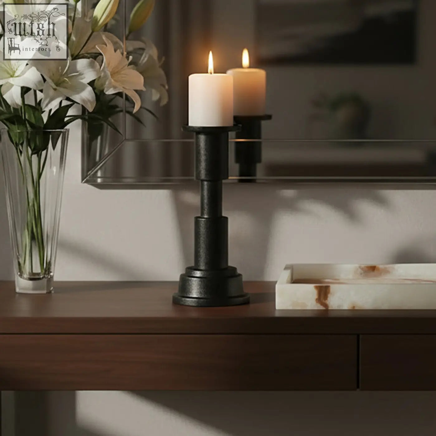 Black metal zac small candle holder with matte finish and cylindrical tiers holding two white small candles