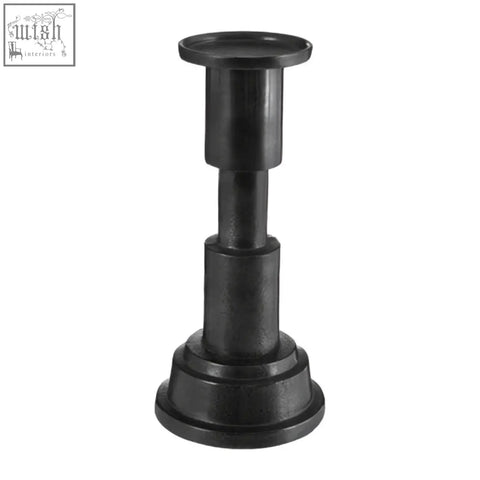 Black metal zac small candle holder with tiered cylindrical sections and flat top for small candle display