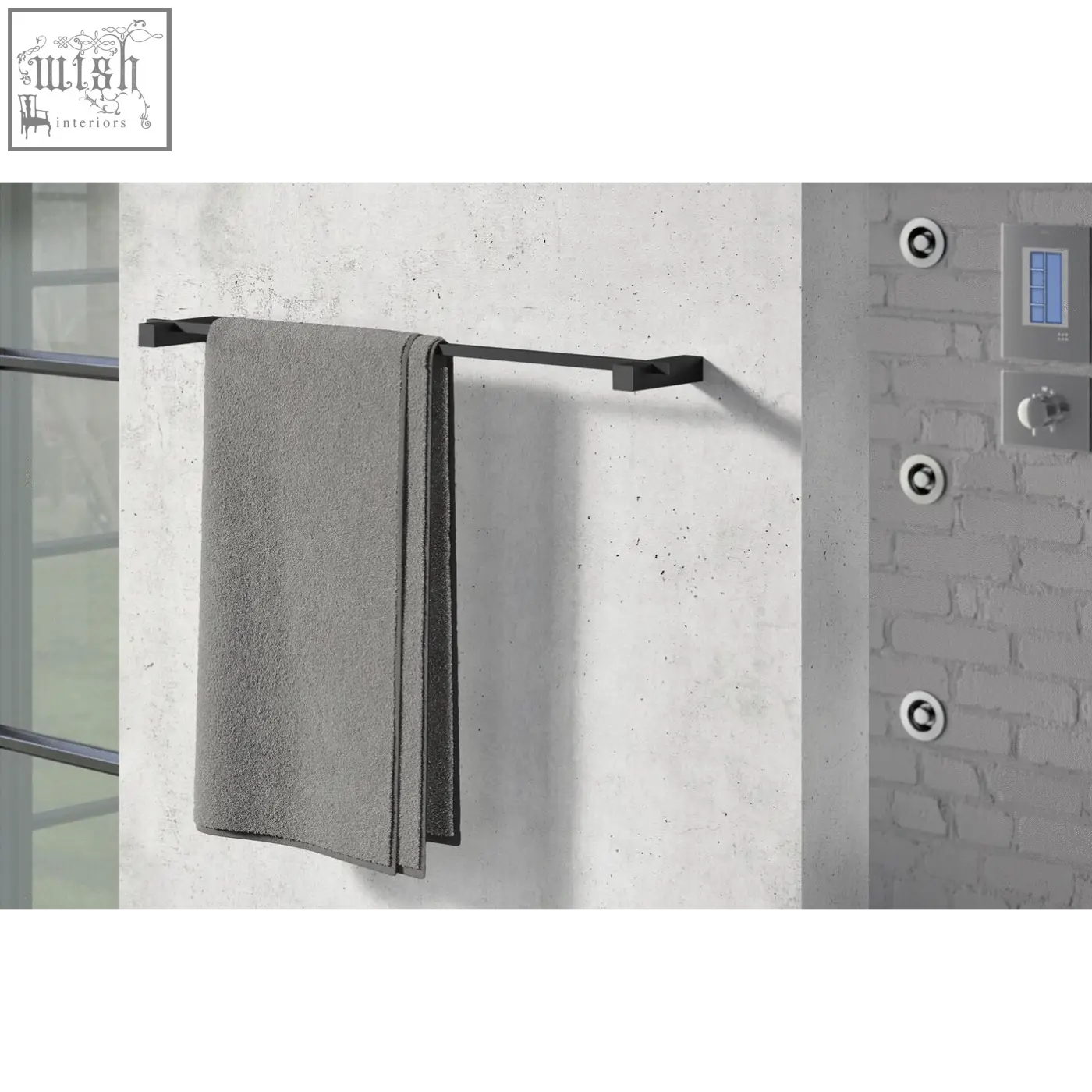 Gray towel hanging on a sleek black powder coated stainless steel carvo towel rail 66 cm by zack carvo