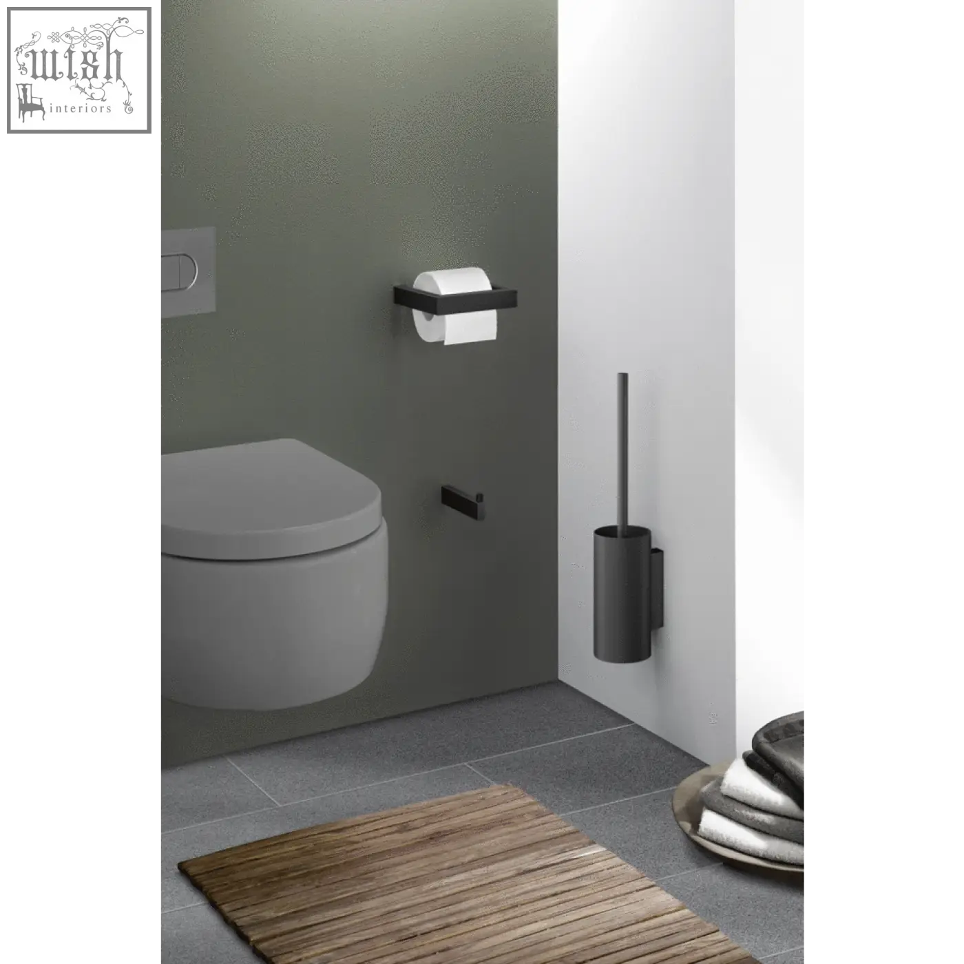 Black matte stainless steel toilet roll holder with sleek minimalist design for modern bathroom use by Zack Linea