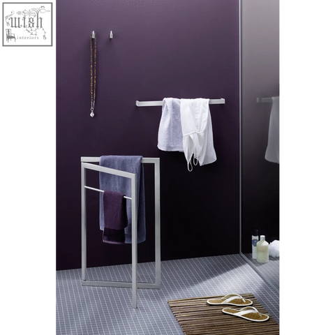 Modern silver-toned stainless steel linea towel rail with minimalist geometric frame design for bathroom use