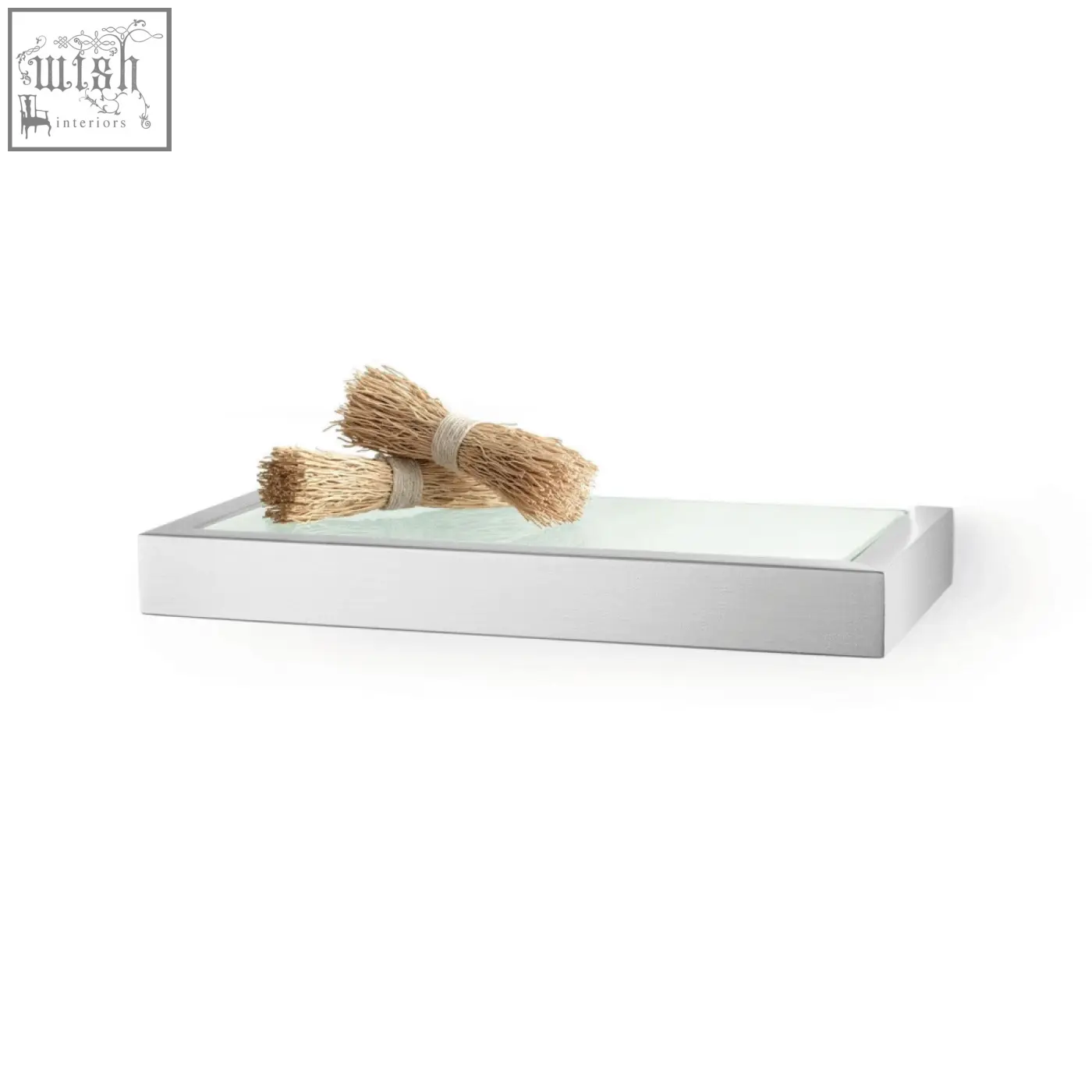 Modern rectangular glass tray with white metallic frame holding natural fiber brushes on linea bathroom shelf