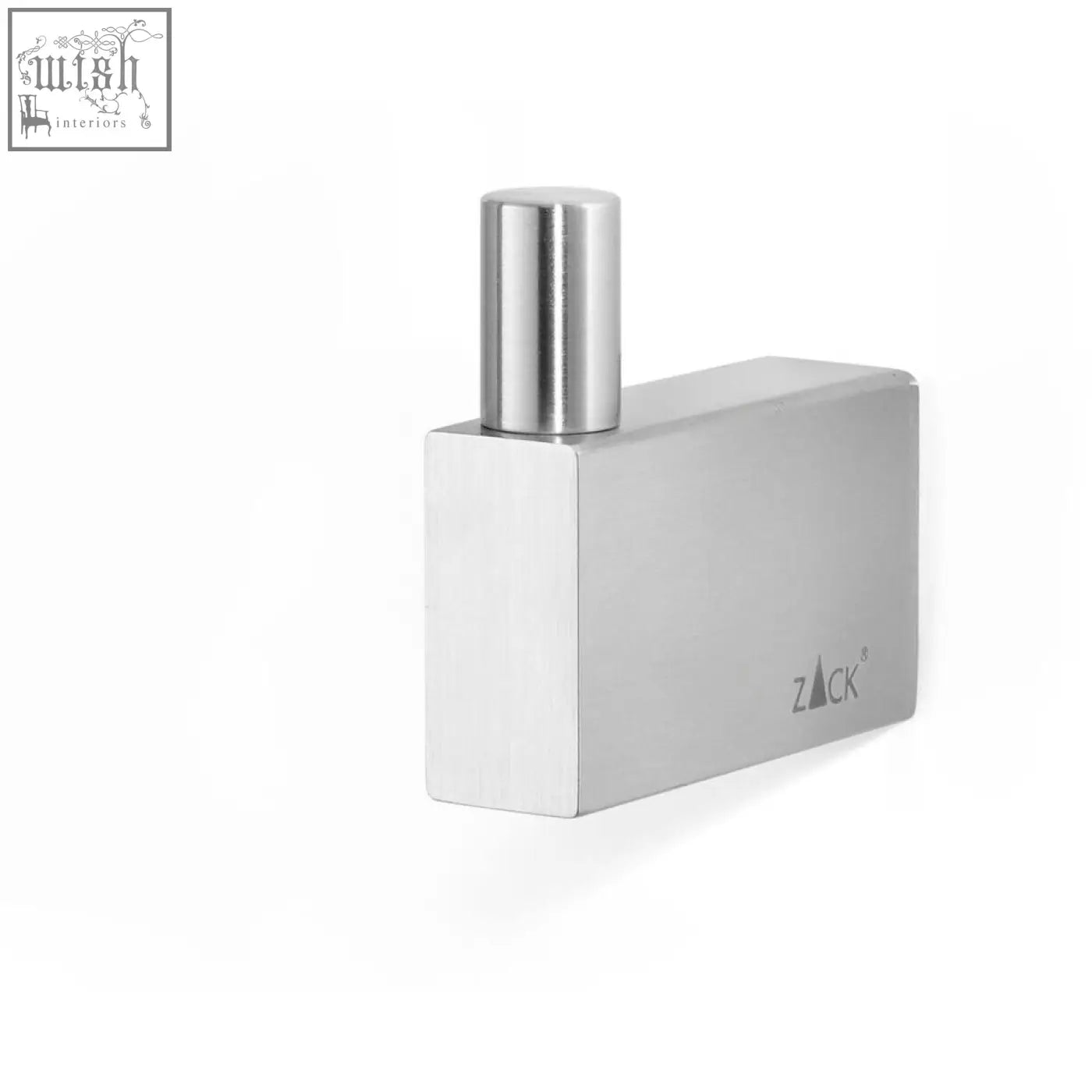 Silver rectangular perfume bottle with sleek minimalist design next to the linea towel hook stainless steel towel hook