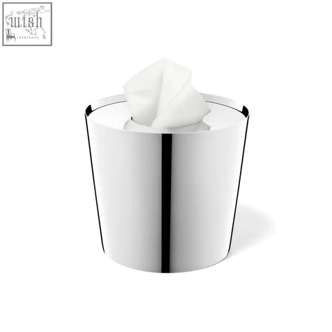 Shiny chrome lyos tissue dispenser in polished stainless steel with a modern design and white tissue pulled out