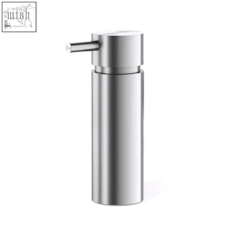 Stainless steel zack manola soap dispenser with sleek cylindrical design and horizontal push-button pump for easy use