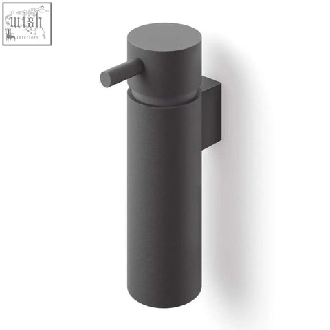 Matte black stainless steel zack manola soap dispenser with sleek cylindrical design and short horizontal pump handle