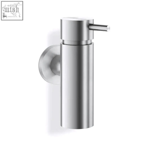 Stainless steel zack manola soap dispenser with sleek cylindrical body and minimalist push-button wall mount design
