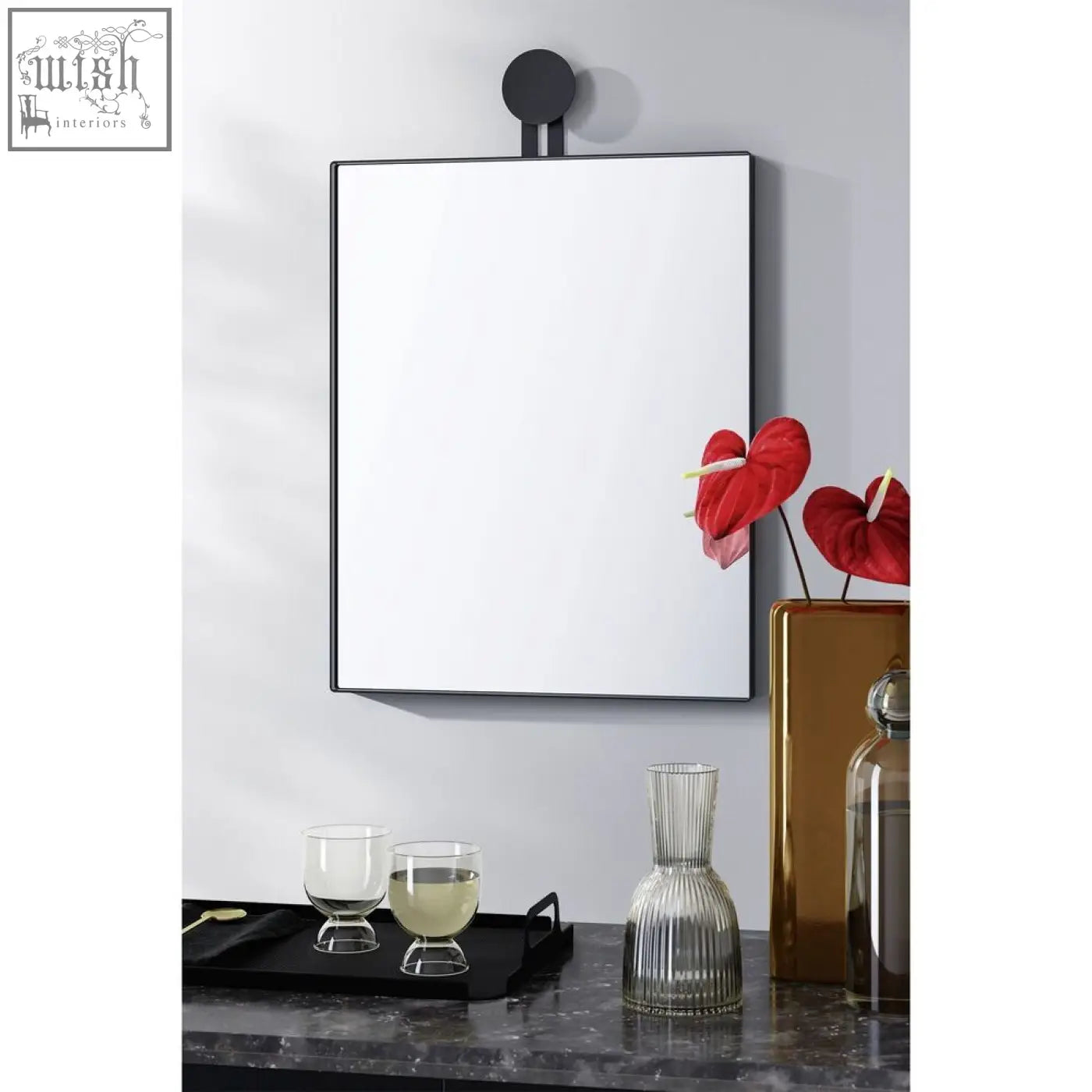 Black-framed zack morma black wall mirror with sleek rectangular steel frame and circular mounting bracket 40x50cm