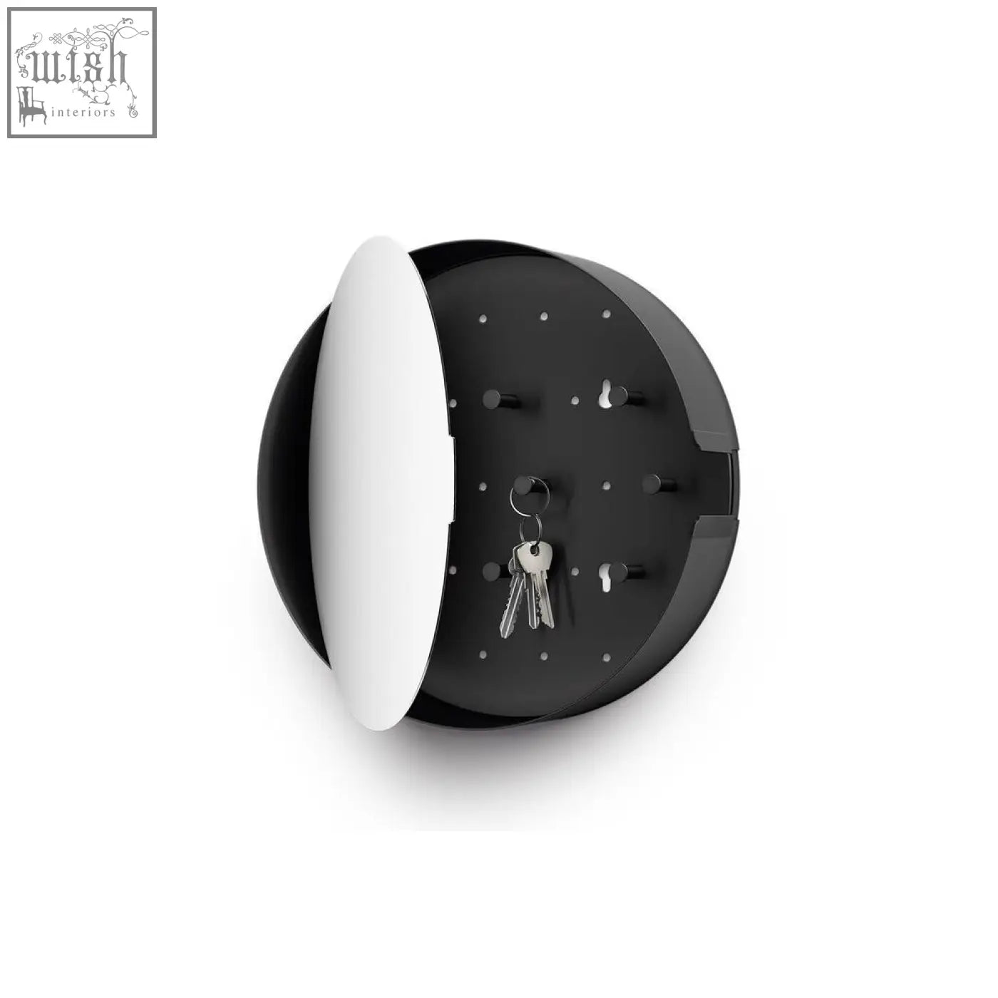 Black circular wall-mounted nolma key cabinet with white hinged lid and multiple hooks for keys by Zack Nolma