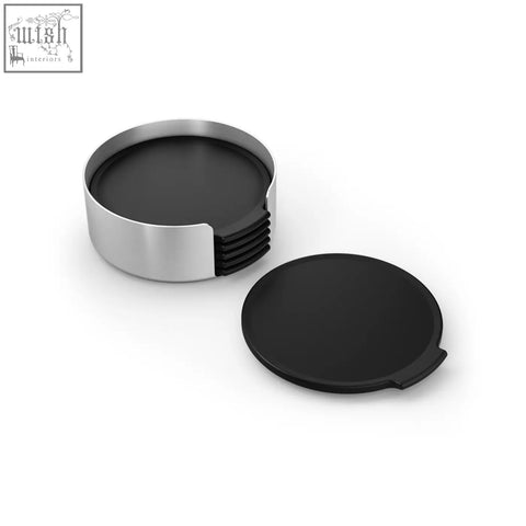Black circular coasters with matte finish in a modern brushed stainless steel holder from zack norta set of 6