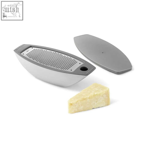 Gray Zack parna cheese grater with stainless steel boat shape and matching lid for easy grating and storage