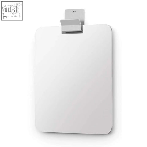 A sleek white fog-free shower mirror with a stainless steel hook and silver magnetic board clip wall mount
