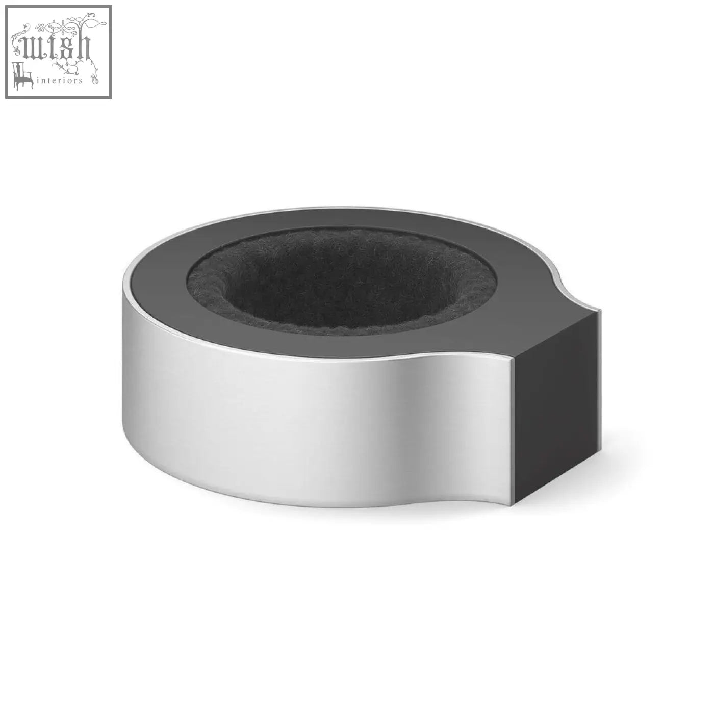 Silver and black cylindrical holder with a foam-lined cavity for secure placement in the zack premiro brushed stainless steel drip ring